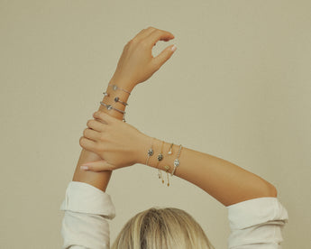 girl wearing lotus flower bracelets